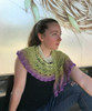 Nautilus Shawlette-Crochet this circular shawlette with one cake of color-morphing "Blossoms". The circular shape hugs your shoulders and the fanciful open-work stitches make this an all season accessory. Pattern available for purchase and download.