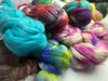 Our Fiber mystery boxes can include anything fiber related — fiber braids in test colors, limited editions, random fiber bases, or even cupcakes and wooly crumb bits!