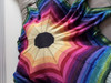 Color drifts softly from the center through 20 vibrant hues, blossoming into a flower-shaped throw. Choose a color for the center, and then use the minis in whichever order you like!