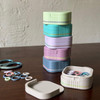 A perfectly pocket-sized sliding box Marker Pod - available in Sprig, Seaglass, Wisteria, Linen, Chambray, and Thistle—each brightened with signature opal accents. Made in Vermont with plant-based plastics.