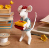This little Librarian Mouse seems deep in thought, carrying a big stack of books. Is it an ambitious to-read pile or are they being tidied away, ready for the next avid reader? It will bring sheer joy to all those who love little mice and their secret lives just out of sight.