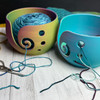 The graceful spiral opening guides your working yarn smoothly while the roomy bowl keeps your skein or cake right where it belongs.