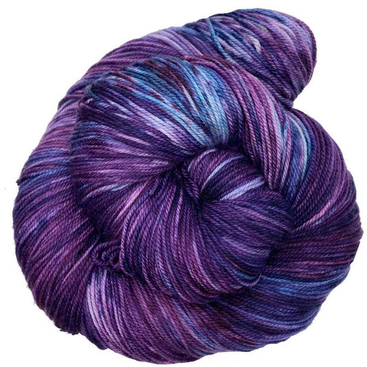 A deep amethyst purple accented with splashes of dark blue and rich pink hand-dyed by Wonderland Yarns on a variety of yarn bases. Made in Vermont.