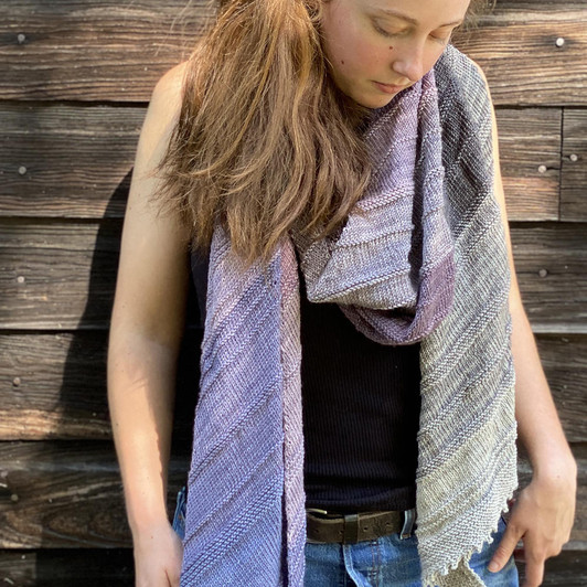 These lovely 13-packs on our Mary Ann yarn base are perfect for completing a simple wrap pattern — which is included in the kit! The Wonderland Yarns 'Ridged & Wrapped' pattern is a great project for beginners and advanced knitters alike.