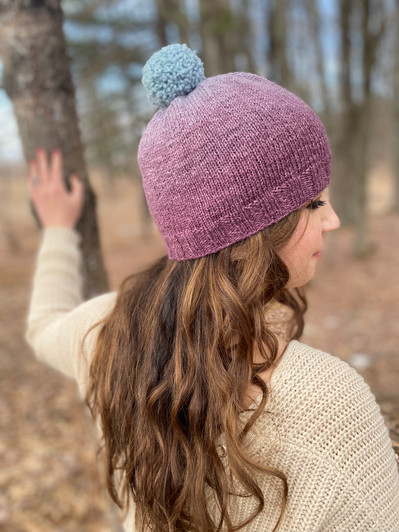 Let the yarn do the work for this simple beanie. Brim can be worn folded up or down, add a couple of inches for additional slouch, and choose whether to pom, or not.