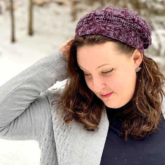 This quick beret project by Wonderland Yarns has a rose texture on top and some simple stitches to make it a good challenge for crocheters of all levels.