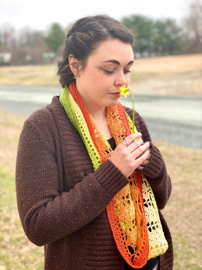 Torch Lily Cowl. Tracy was inspired by the colors in this Blossom to create a cowl that begins with the suggestion of garden greenery and blooms into a brilliantly colored Torch Lily. Pattern available for purchase and download.