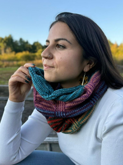 Simple knitting transforms into bold stripes and sculptural columns of color — the kind of project that looks far more complex than it is.