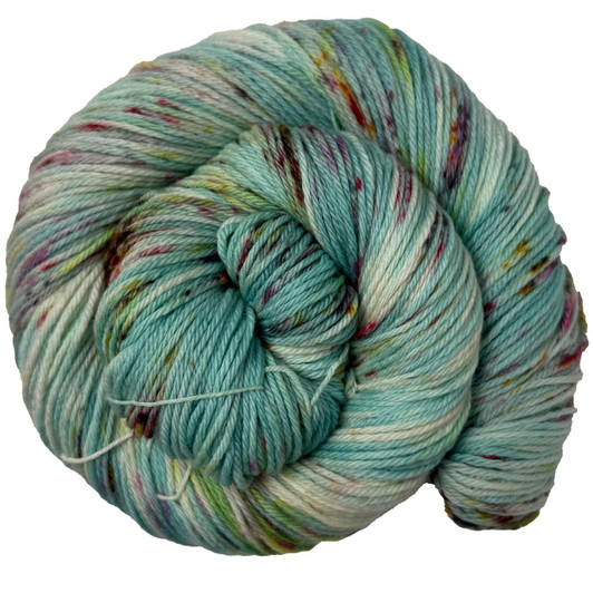 A seafoam green variegated speckled with rose and sunny yellow, hand-dyed in Brattleboro, VT.