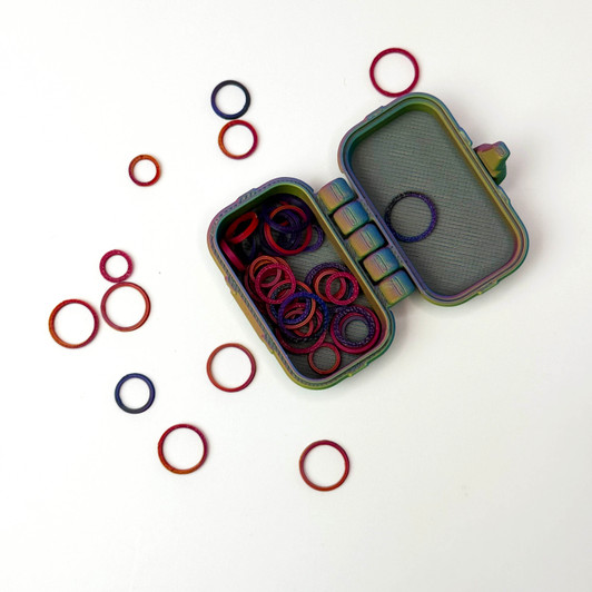 Oodles of Stitch Markers is your new favorite little helper for keeping every stitch in its place. Tucked inside a pop-top case, you’ll find an assortment of more than 40 stitch marker rings ready to jump from project to project.