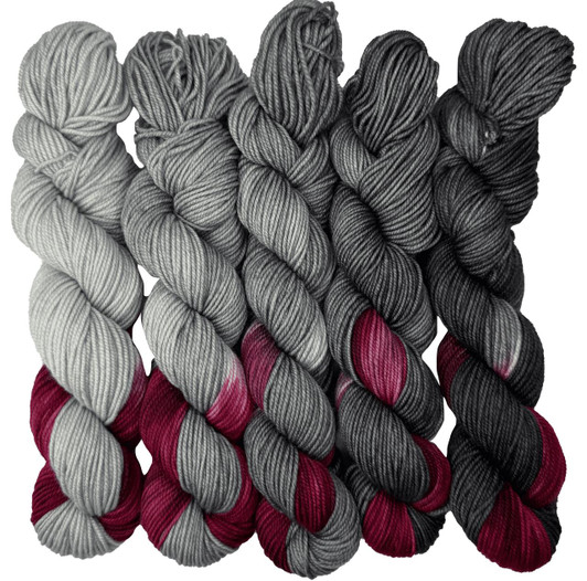 A collection of five, hand-dyed, 1 oz mini-skeins that make up a light to dark grey gradient with a burst of crimson. These popular neutral classics can weave into any project, from socks, mittens, hats and more! Perfect for assigned pooling projects.