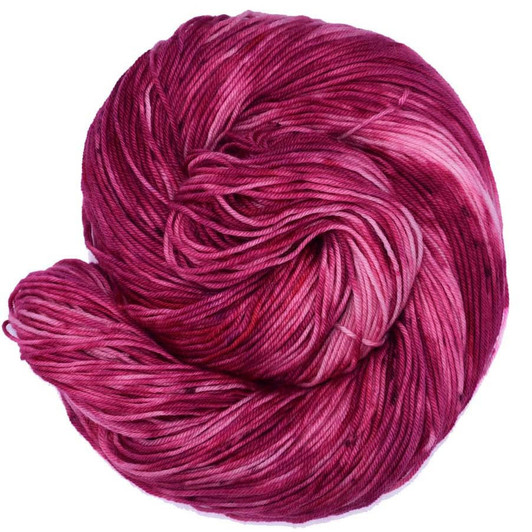 A cheerful, bold magenta-based pink with dark burgundy specks, is available on your choice of yarn bases. Hand dyed by Wonderland Yarns, made in America.