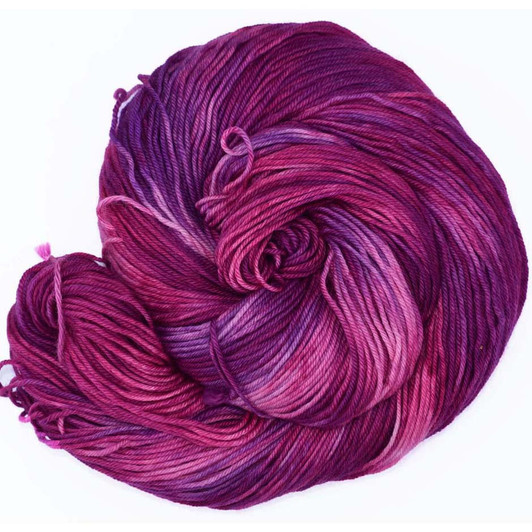 This intense magenta shade has heavy doses of a purply-pink, for rich, bold color, is available on your choice of yarn bases. Hand dyed by Wonderland Yarns, made in America.