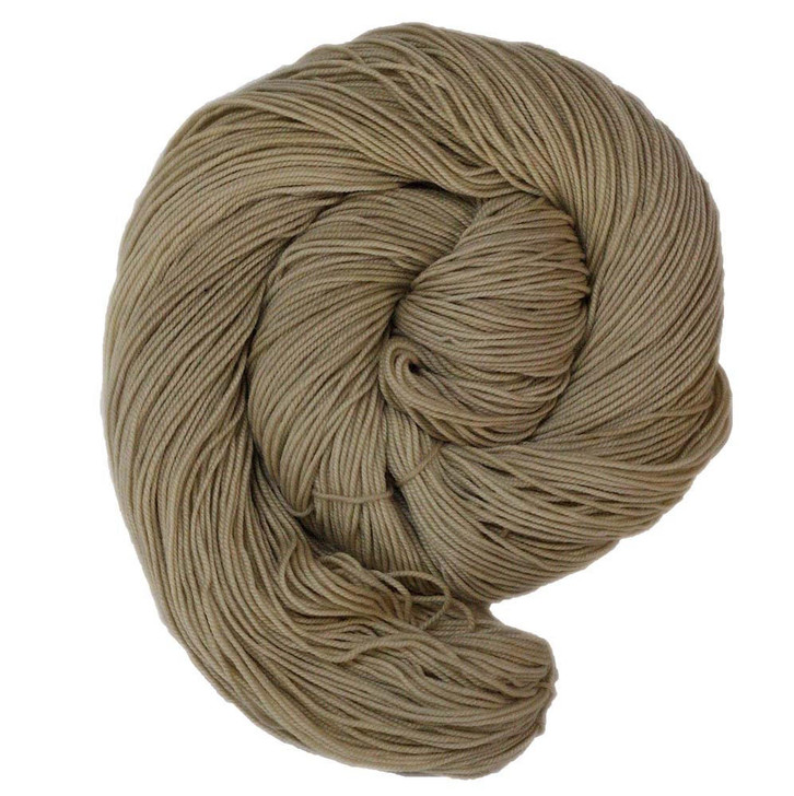 A creamy ecru solid tonal yarn, hand-dyed by Wonderland Yarns is available on your choice of yarn bases. Made in the USA.