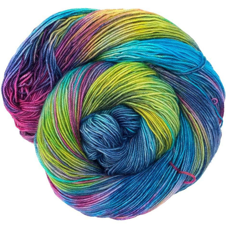 A denim blue filled with splashes of bright yellows and pinks, hand-dyed by Wonderland Yarns on a variety of yarn bases. Made in the USA.