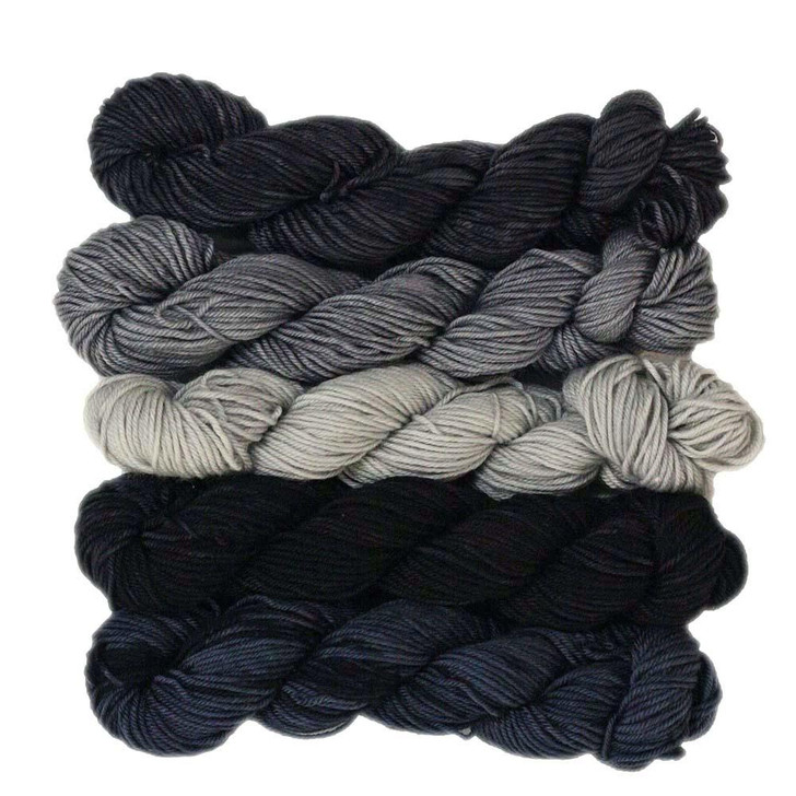 Coal and Scuttles a collection of five coordinating mini-skeins in black, dark gray, light gray, medium gray, and navy blue. Hand-Dyed in Vermont by Wonderland Yarns.