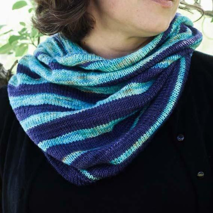 One color shrinks while the other one grows in this cozy, over-sized cowl. Kit comes with two skeins of coordinating Mary Ann fingering yarns and the pattern. Hand-dyed yarn by Wonderland Yarns. Made in Vermont.