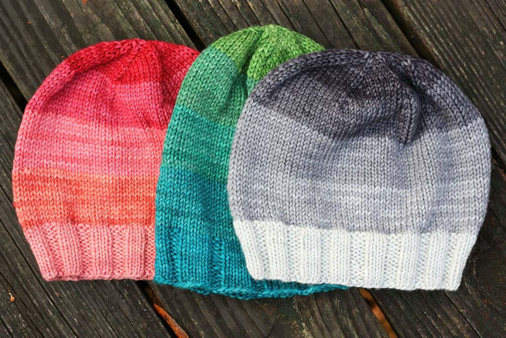 Latitude Lines Hats for All-Make striped, slouchy hats for everyone in the family! Sized from toddler on up to adult large, not a head in your household will go cold when the temperature drops. Free pattern available for download.