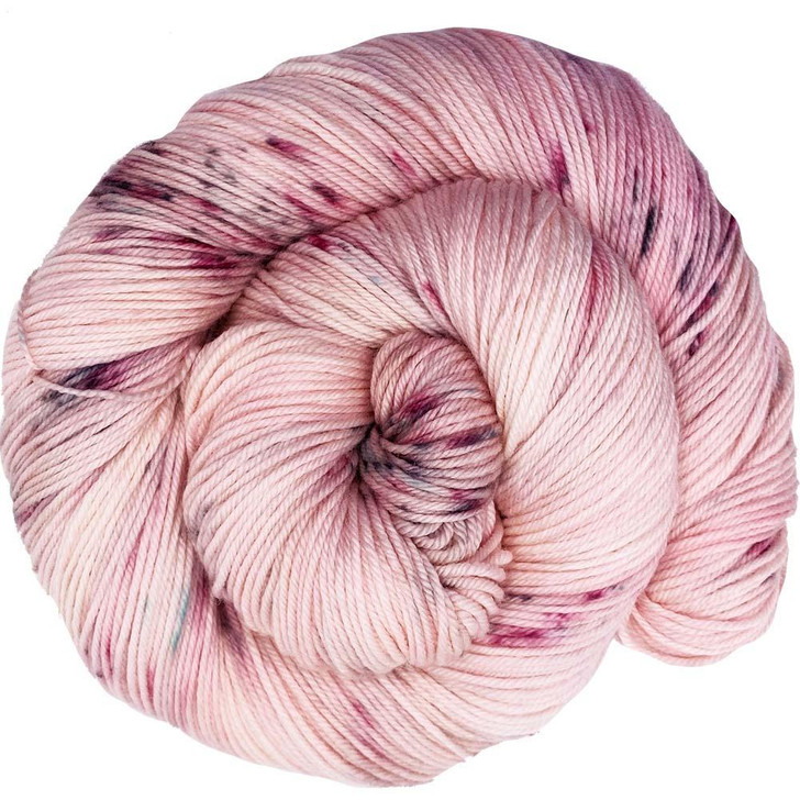 Berry Cupcake is a pale blush-pink with a subtle speckles of gray, blue and dark pink. Shown on Wonderland Yarns Mad Hatter sport weight yarn base. Hand-dyed in Vermont.