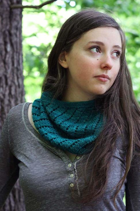 Spiral Eyelet Cowl- Use one skein “Mad Hatter” to make a single or double-wrap cowl with spiraling ridges and eyelets. This magical lace pattern is complicated when worked flat, but when worked in the round you only need to remember one simple row. Free pattern available for download.