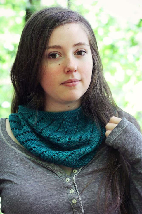 Spiral Eyelet Cowl- Use one skein “Mad Hatter” to make a single or double-wrap cowl with spiraling ridges and eyelets. This magical lace pattern is complicated when worked flat, but when worked in the round you only need to remember one simple row. Free pattern available for download.