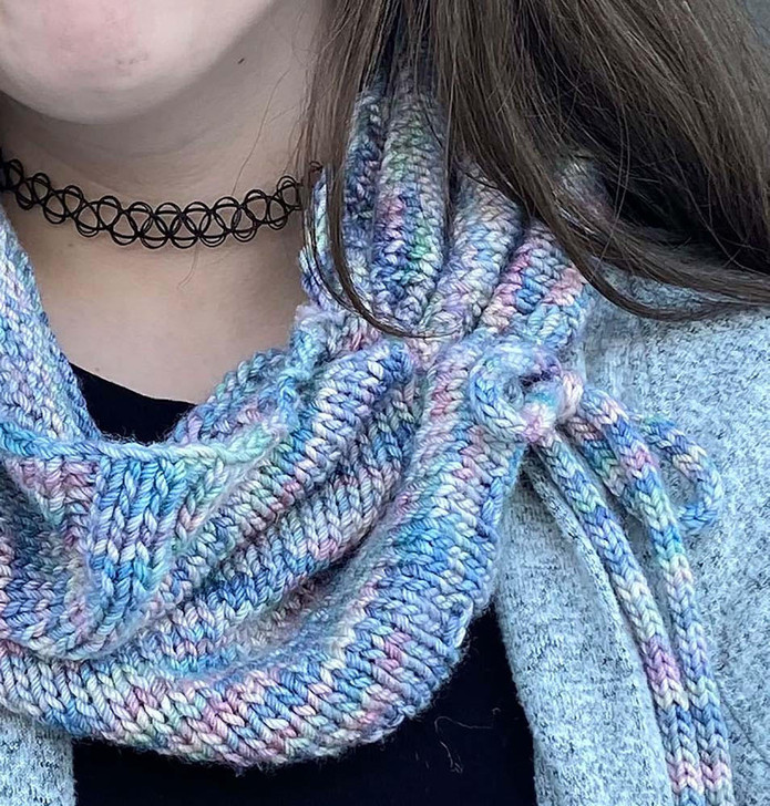 This simple cowl gets an i-cord tie to create a scrunched effect.  Lovely in any hand-dyed yarn.  Free knitting pattern download.