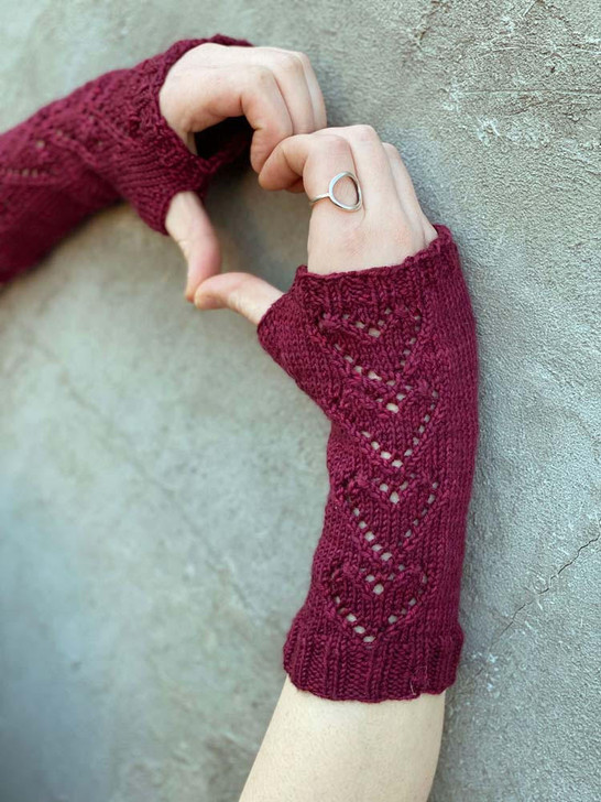 Love Struck Mitts-Put your heart on your sleeve… er, wrists… with these adorable fingerless mitts. Perfect to knit up for gifts or just to keep warm in the office! This pattern was featured in our 2020 De-Stitch-Nation Yarn Club.