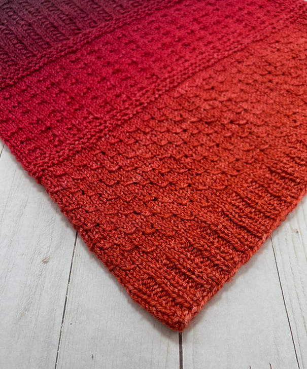 One cake of color-changing Wonderland Yarns  “Blossoms” and three simple, textured patterns come together to create this stitch sampler cowl. Each pattern is a series of different dashes reminiscent of secret codes. Digital Pattern download only