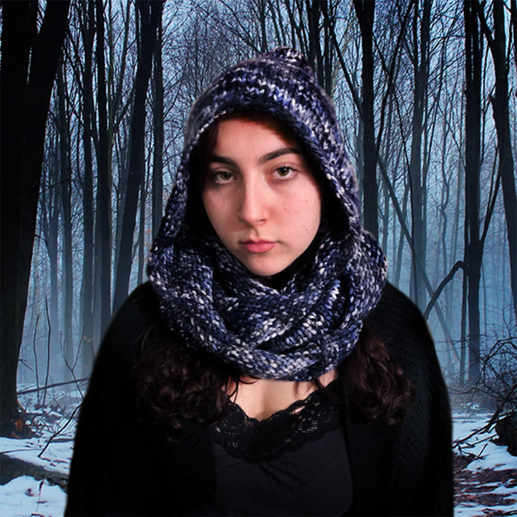 Inspired by the “snood” from the show “Wednesday” this hooded cowl can be double-wrapped around the neck and worn with the hood up or down. Unlike Wednesday, you’ll be so stylishly cozy, it’ll be hard to be sulky.
