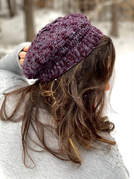 This quick beret project by Wonderland Yarns has a rose texture on top and some simple stitches to make it a good challenge for crocheters of all levels.