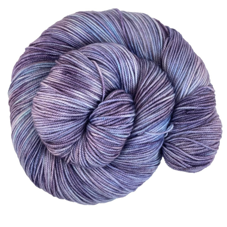 A light dusky purple layered with silvery blue from our Magical Menagerie collection. This colorway is available on a variety of yarn bases. Hand-dyed in the USA.