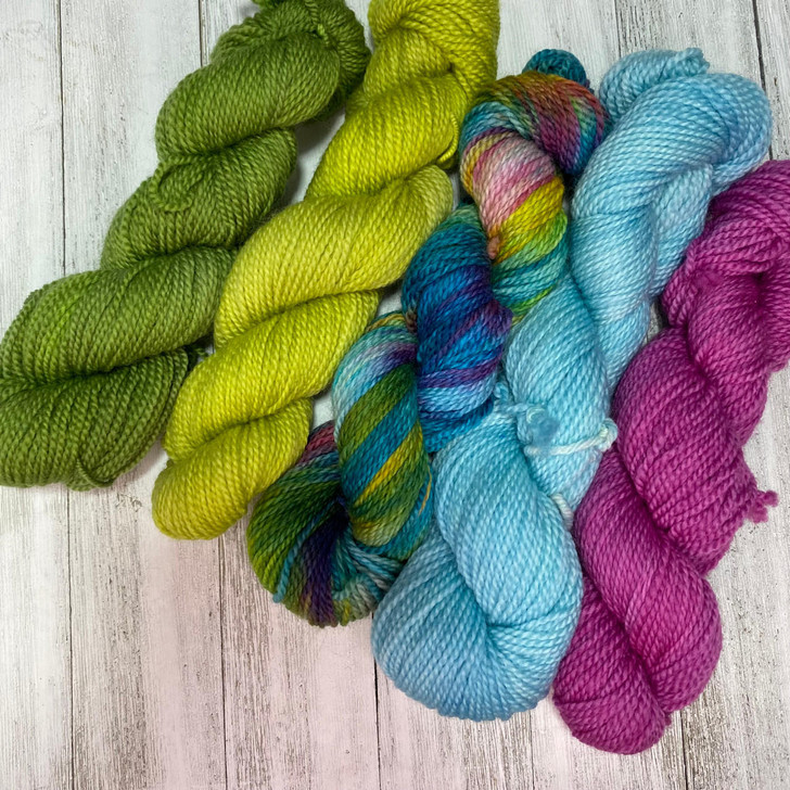 First Day of Spring is a vibrant limited edition colorway mini skein set from Wonderland Yarns.
