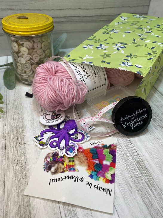 Mystery Date bag will include a BLOSSOM — not a 4 oz skein. Image is an example of what can be included.