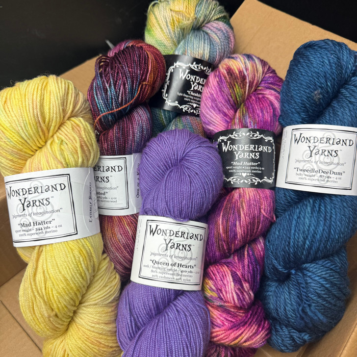 This is an example of how much yarn is included in a regular mystery box! A range of weights, colors, dye styles, and more can be added. Extra mystery goodies not shown.