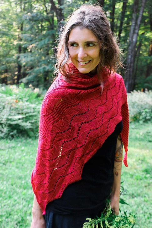 Red Queens Shawl-One may describe the Red Queen as contrary and paradoxical, but sometimes that's a good thing, as in this tip-to-tip knit shawl with two distinct stitch patterns. Half in ribbing, and half in lace stitch, this shawl pairs no-nonsense straight lines with lovely, rippling waves. Bold yet feminine. Pattern available for purchase and download.