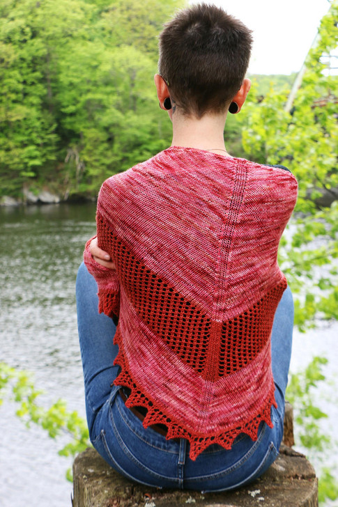 Wonderland Shawlette. Knit with a skein each of a solid and a variegated yarn, this shawlette is a great project for pairing up two irresistible skeins. Worked from the edging-up, with mesh details, it’s a satisfying quick-knit. Free pattern available for download.