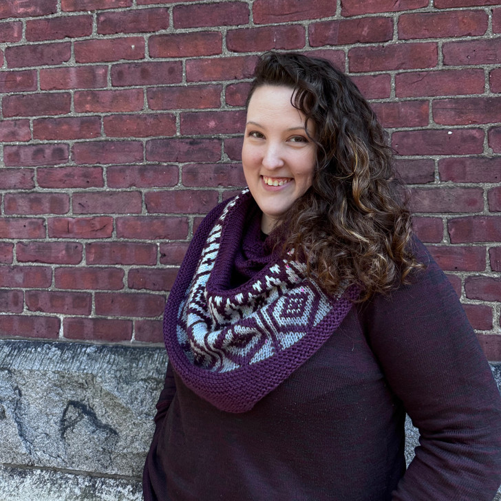 Shaped by the magic of half pi construction, the colorwork of this DK-weight shawl conjures the soaring lines of gothic cathedrals and shadowed archways.