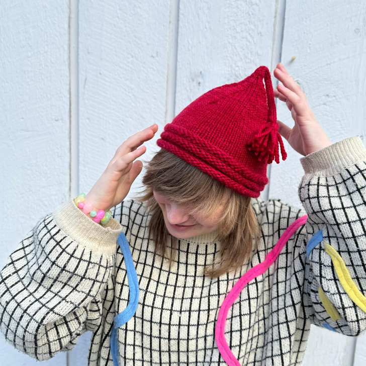 This hat is a quick, satisfying knit in bulky yarn, designed for warmth and everyday wear.

Its red color is inspired by simple knit caps associated with the Norwegian idea of menneskeverd — the belief that every person has inherent worth simply by being human.