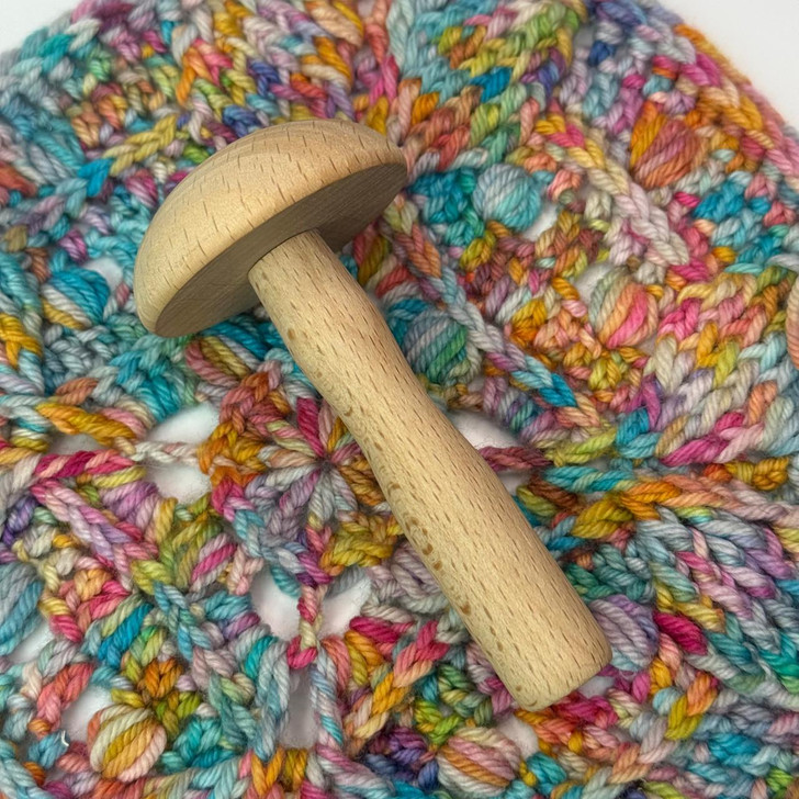 Equal parts practical and charming, this whimsical mushroom darner is a handy companion for mending socks, repairing knitwear, and reinforcing well-loved garments.