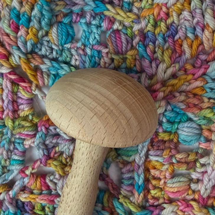 Equal parts practical and charming, this whimsical mushroom darner is a handy companion for mending socks, repairing knitwear, and reinforcing well-loved garments.