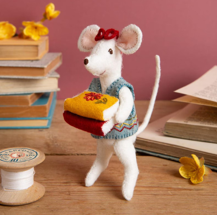 This little Librarian Mouse seems deep in thought, carrying a big stack of books. Is it an ambitious to-read pile or are they being tidied away, ready for the next avid reader? It will bring sheer joy to all those who love little mice and their secret lives just out of sight.