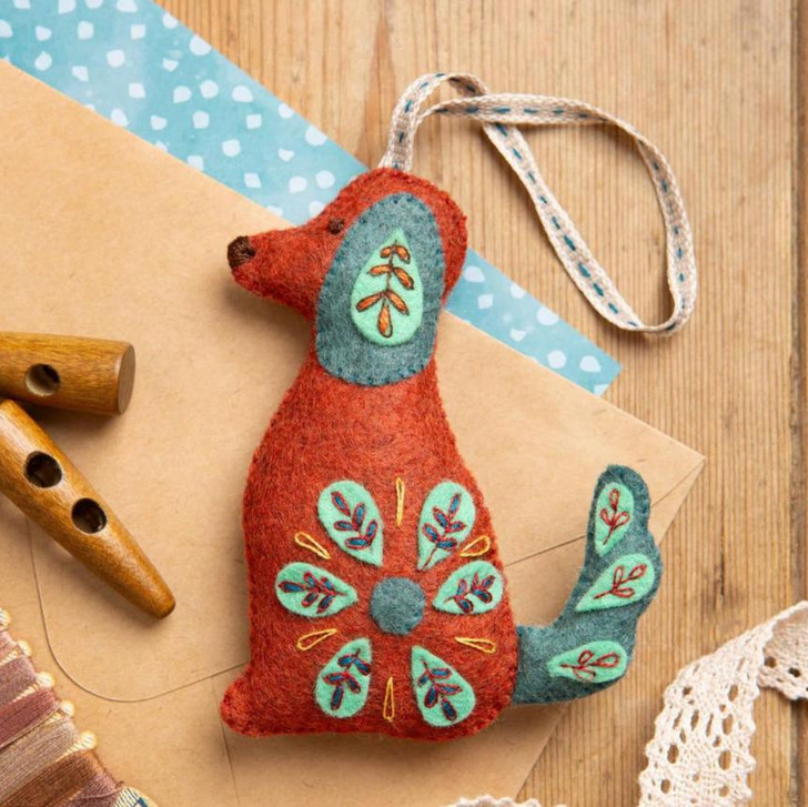 This charming Folk Embroidered Dog is instantly recognisable as a classic Corinne Lapierre design. Her love of folk art is evident in all her creations and this delicately embroidered animal is a perfect example of her craft and style.
