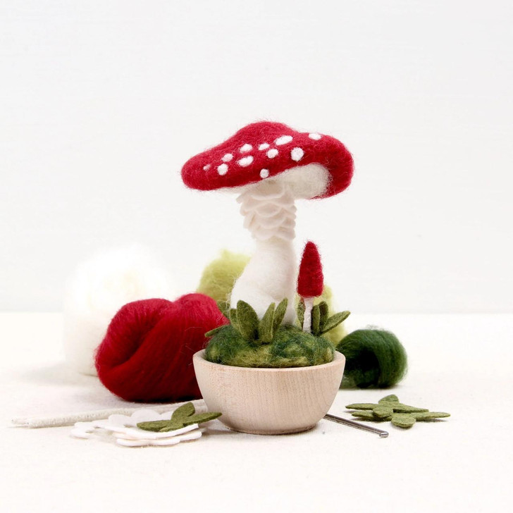 Fairytales and folklore inspired by red capped mushrooms and needle felted magic. Modeled after the Fly Agaric mushroom, the Crimson Toadstool needle felting kit includes all the supplies to make your own mushroom: felting needle, foam cushion, roving, cotton stems, felt accents and a wood turned bowl. You will need scissors or wire cutters. Glue is optional. Instruction sheet includes step by step instructions and photos. For the enthusiastic beginner.