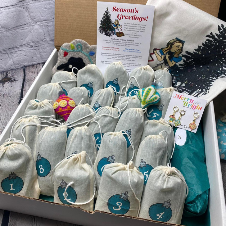 The 2023 yarn advent from Wonderland Yarns had each colorway clearly labeled in each bag for easy opening.