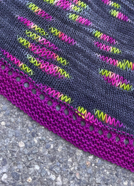 This top-down, half-circle shawl kit from Wonderland Yarns is all about easy knitting and color. Elongated stitches worked at the Colorbursts keep the knitting interesting, creating a playful fizz of texture and hue.