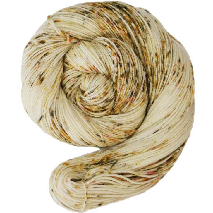 A natural yarn, speckled with browns, golds, and vermillion, is available on your choice of yarn bases. Hand dyed by Wonderland Yarns, made in America.