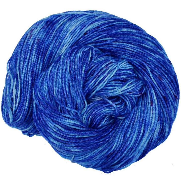 A bright, brilliant blue with hints of teal and specks of pink, is available on your choice of yarn bases. Hand dyed by Wonderland Yarns, made in America.