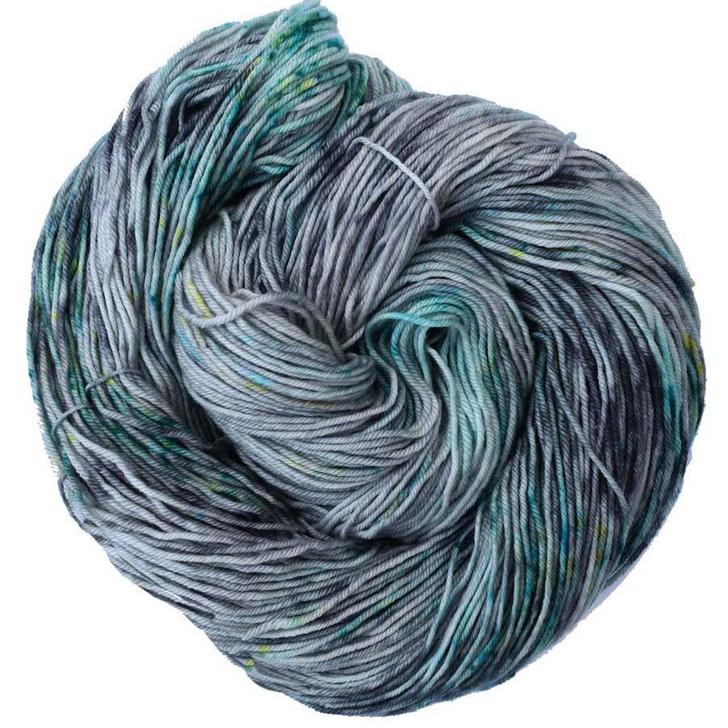 A silver backdrop is speckled with shades of teal, yellow, and turquoise, is available on your choice of yarn bases. Hand dyed by Wonderland Yarns, made in America.