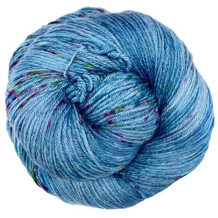 A soft blue yarn, smothered with a rainbow of speckles, is available on your choice of yarn bases. Hand dyed by Wonderland Yarns. Made in USA.