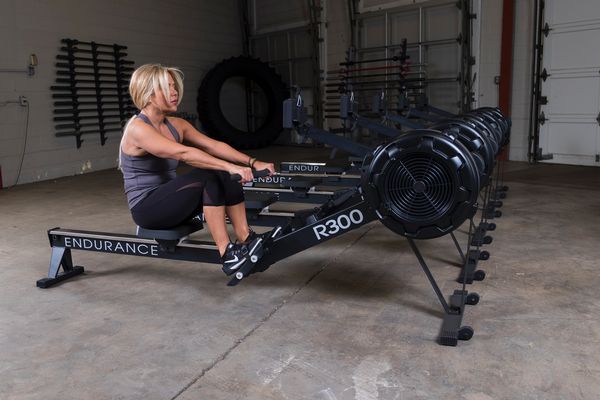 Ongoing lower body training using a rowing machine.